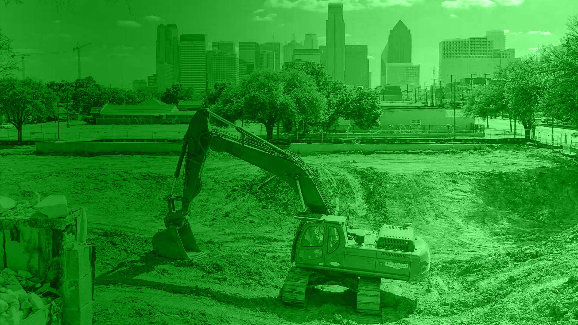excavator-in-front-of-city-skyline-st-alexandria-oh